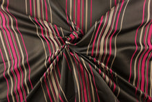 Load image into Gallery viewer, This rich woven yarn dyed fabric features narrow width dark pink and brown tone stripes on a dark brown ground
