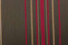 Load image into Gallery viewer, This rich woven yarn dyed fabric features narrow width dark pink and brown tone stripes on a dark brown ground. 
