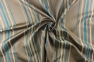 Teal blue and cream stripes on a darker taupe background